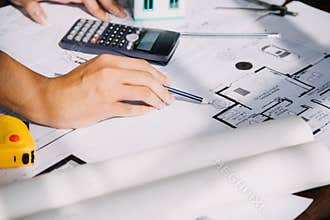 Diverse Team of Specialists Use Tablet Computer on Construction Site. Real Estate Building Project with Civil Engineer, Architect