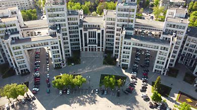Aerial sunny Derzhprom building boomshot footage