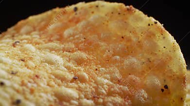 Crispy Close-Up: Golden Tortilla Chip Texture and Detail Unveiled