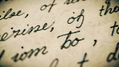 Macro Panning Shot Across an Old Handwritten Letter with Cursive Script