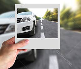 Hand With Photo of Car