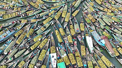 Aerial view of floating market of seasonal fruits on the boats in Kaptai Lake, Rangamati, Bangladesh.