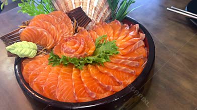 Close-up of Vibrant Fresh Salmon Slices Ready to Serve.