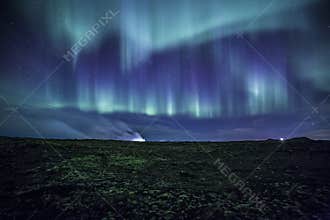 Aurora over mossy Icelandic Lava Field