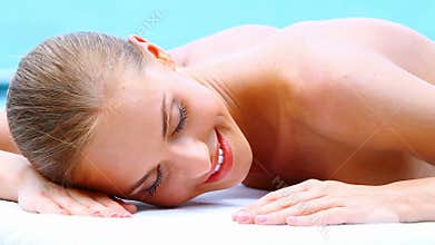 Cute woman is taking spa treatment