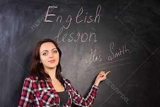 Young teacher introducing herself to the class
