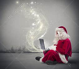 Santa Claus with laptop