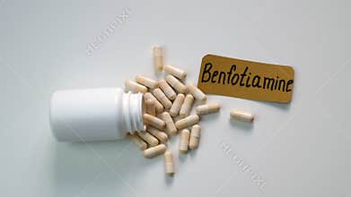 Benfotiamine capsules and vitamin supplements. Selective focus.