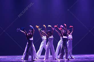Graceful Contemporary Dancers Performing Elegant Blue Stage Routine