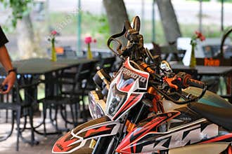 KTM Motorcycles Parked At Outdoor Cafe In Kyiv