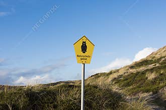 Owl sign - landscape conservation in Sylt, Germany