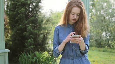 Young redhair woman use mobile phone shopping online and pay with internet banking
