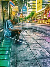 Alone man at busstation on thailand