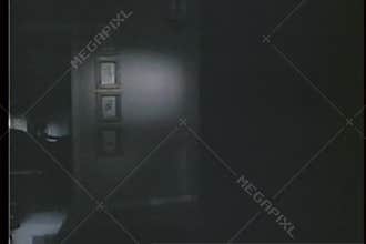 Point of view of person walking through dark house