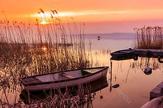 Sunset on the lake Balaton with a boat
