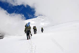 Climbing three climbers on Titnuld