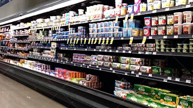 Dairy and frozen food corridor in Save on Foods.