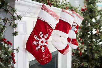 Empty Stockings Hung On Fireplace On Christmas Eve