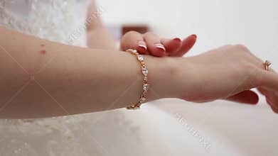 Hands of the bride dress nice bracelet