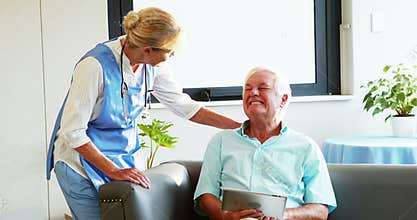 A nurse visiting a senior patient