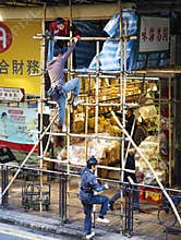 Workers on scaffold
