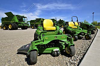 New John Deere combines and riding lawn mowers