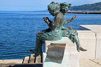 Le Sartine statue at Trieste waterfront in Italy