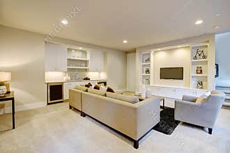 Chic basement living room with wet bar