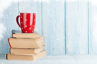 Hot chocolate cup on books