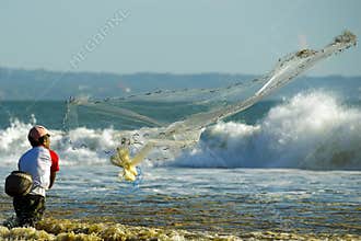 Man fishing in polluted water