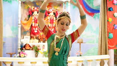 A lovely young woman in traditional dance costume