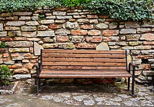 Bench and stone wall