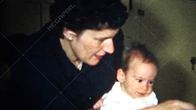 (8mm Vintage) Mom Feeding Baby 1956