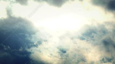 Cloudscape with fluffy clouds and sunrise