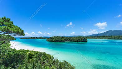 Tropical island beach and clear blue lagoon, Okinawa, Japan