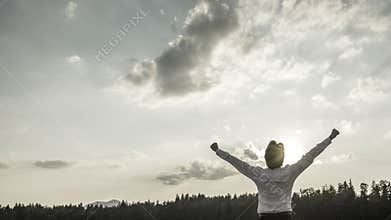 Desaturated conceptual image of victory, power and success