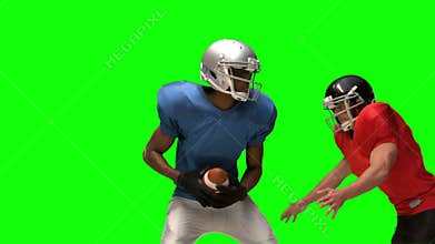 Serious american football player tackling for ball