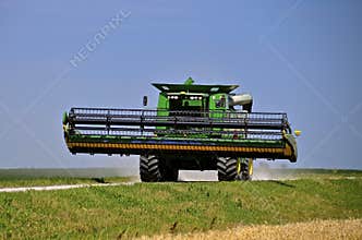Self propelled combines travels on road