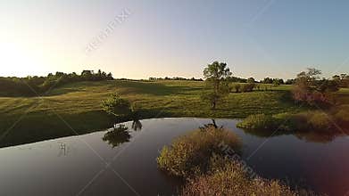 Video copter flight at sunset