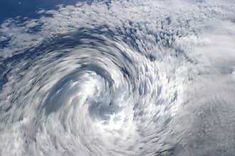 Cyclone clouds, eye of storm.