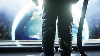 Alone astronaut in futuristic space corridor, room. view of the earth. cinematic 4k footage.