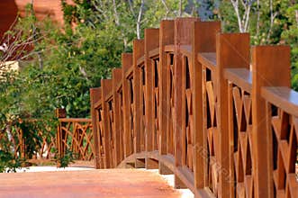 Wooden Fence Railing Across Bridge