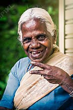 Happy old indian woman. Elderly wrinkles