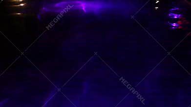 Colorful water surface with changing color.