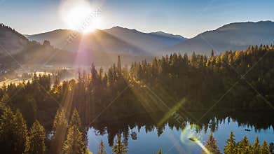 Sunrise lake mountains Switzerland Aerial 4k