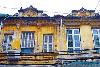 Front French colonial house windows, Hanoi, Vietnam