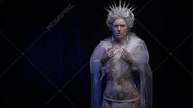 Snow Queen with body art, posing in the studio