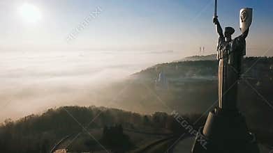 Kiev Ukraine. View from the hill with The Motherland Monument. erial video footage. Deep fog. Beautiful autumn morning