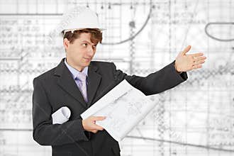 Engineer in a helmet pointing direction