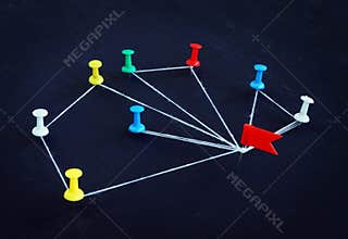 Concept of communication and delegation. Pins connected by thread